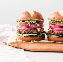 A couple of plated burgers